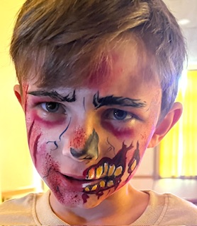 Boy with zombie face painting in Shrewsbury